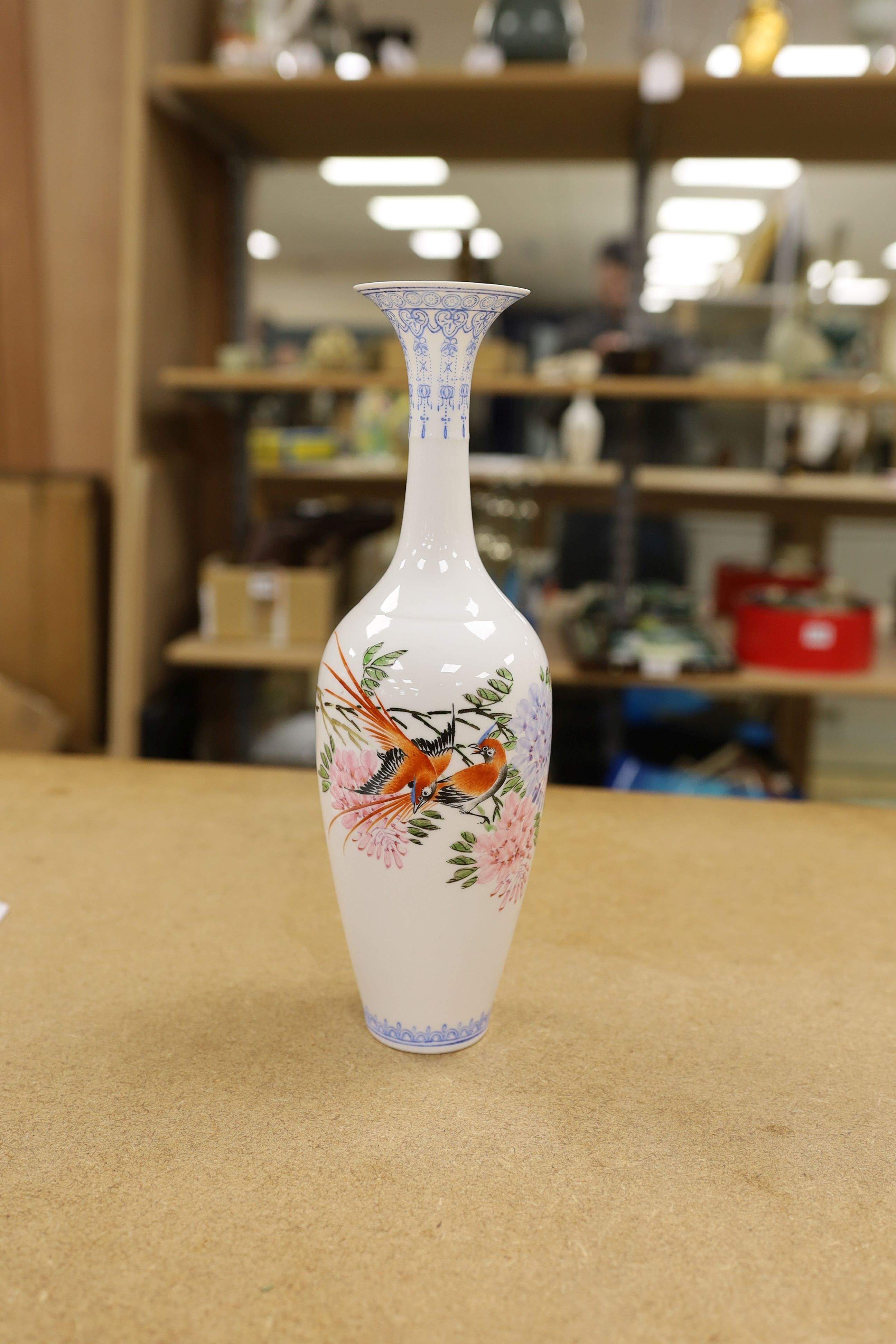 Three Chinese porcelain vases, tallest 26cm